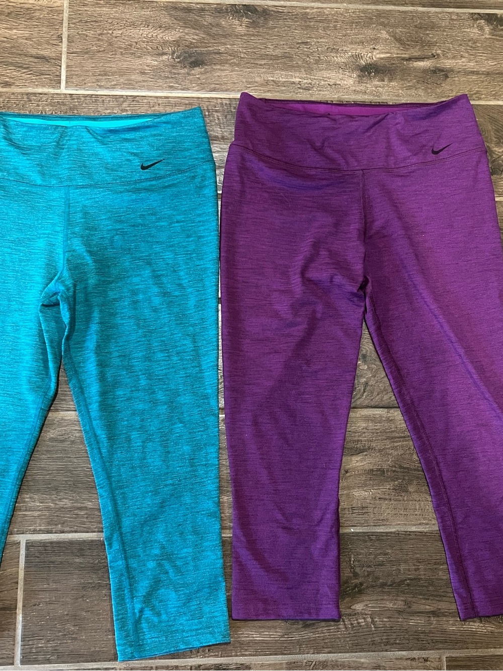 Nike Women’s size Medium Purple and Teal Capri Leggings Duo